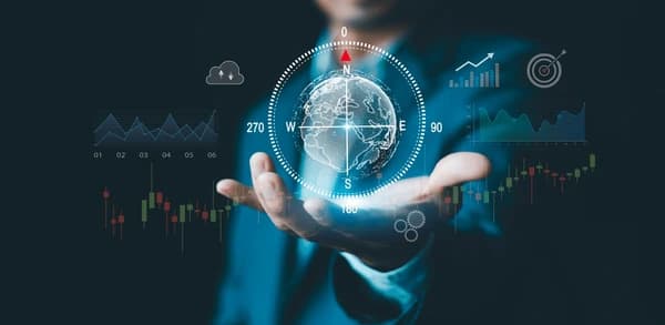 THE BUSINESS COMPASS